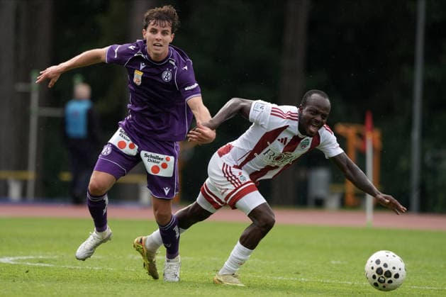 July 23, 2026, Riga, Latvia: Florian Wustinger of FK Austria Wien and Abiodun OGUNNIYI of FK Liepaja in action during the UEFA Europa Conference League qualifying round game between LatviaÃ¢â‚¬â ¢s FK Liepaja and Austria Wien in Sloka, Latvia 23.07.2026. Photo: Roman Koksarov Soccer 2026: Liepaja Vs Austria  - ZUMAk209 20260723_zsp_k209_008 Copyright: xRomansxKoksarovx