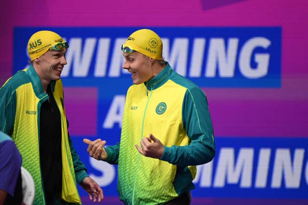 COM26 SWIMMING HEATS, Zac Stubblety-Cook (left) and Bailey Lello of Australia wait as officials attempt to fix a broken lane rope ahead of the Men™s 100m Breaststroke heats at the Glasgow 2026 Commonwealth Games at the Tollcross International Swimming Centre in Glasgow, Scotland, Friday, July 24, 2026. ( NO ARCHIVING, EDITORIAL USE ONLY Glasgow Scotland United Kingdom  Copyright: xDEANxLEWINSx 20260724124755356160