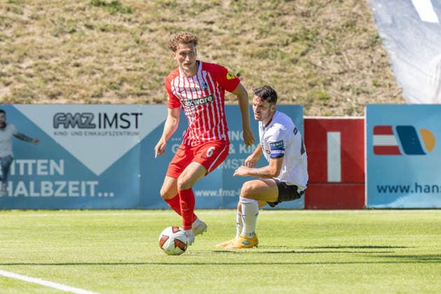 SOCCER - Freiburg vs Derby, test match IMST,AUSTRIA,24.JUL.26 - SOCCER - 1. DFL, 1. Deutsche Bundesliga, EFL Championship, SC Freiburg vs Derby County FC, test match. Image shows Patrick Osterhage (Freiburg and, Lewis Travis (Derby County).  GEPAxpictures xMichaelxKristen