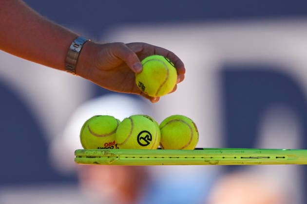 TENNIS - ATP, Tennis Herren Generali Open 2026 KITZBUEHEL,AUSTRIA,24.JUL.26 - TENNIS - ATP World Tour, Generali Open. Image shows a feature with a hand, balls and a racket.  GEPAxpictures xDanielxSchoenherr