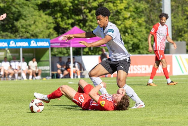 SOCCER - Freiburg vs Derby, test match IMST,AUSTRIA,24.JUL.26 - SOCCER - 1. DFL, 1. Deutsche Bundesliga, EFL Championship, SC Freiburg vs Derby County FC, test match. Image shows Remi Harvey (Derby County and Philipp Treu (Freiburg).  GEPAxpictures xMichaelxKristen