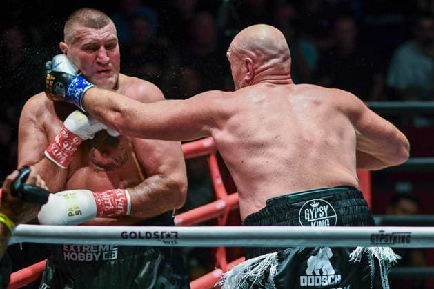 July 24, 2026, Pattaya, Chonburi, Thailand: Tyson Fury (L) and Mariusz Wach (R) exchanging punches during their heavyweight boxing bout. Tyson Fury defeats Mariusz Wach by corner retirement after seven rounds to win the WBC Humanitarian Belt at Max Muay Thai Stadium. Pattaya Thailand - ZUMAs197 20260724_aaa_s197_084 Copyright: xWasimxMatherx
