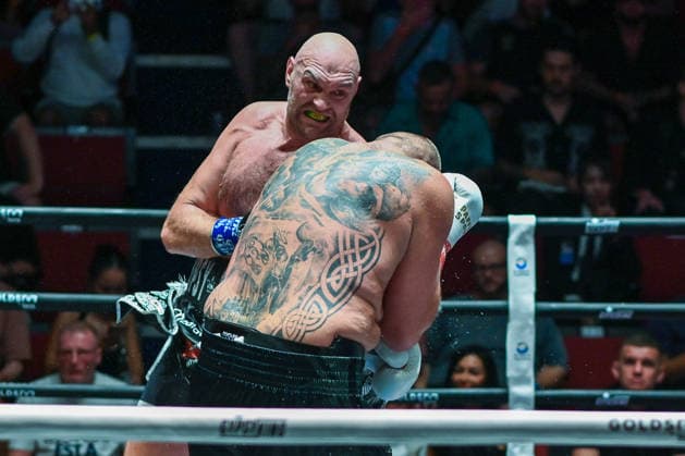 July 24, 2026, Pattaya, Chonburi, Thailand: Tyson Fury (L) and Mariusz Wach (R) trading punches during their heavyweight boxing bout. Tyson Fury defeats Mariusz Wach by corner retirement after seven rounds to win the WBC Humanitarian Belt at Max Muay Thai Stadium. Pattaya Thailand - ZUMAs197 20260724_aaa_s197_086 Copyright: xWasimxMatherx