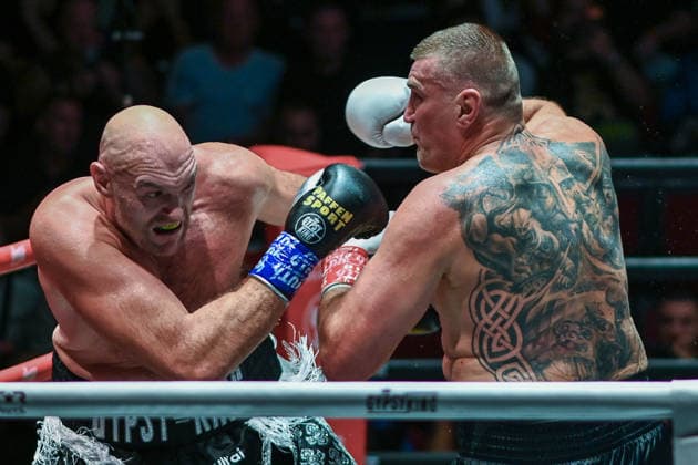 July 24, 2026, Pattaya, Chonburi, Thailand: Tyson Fury (L) and Mariusz Wach (R) trading punches during their heavyweight boxing bout. Tyson Fury defeats Mariusz Wach by corner retirement after seven rounds to win the WBC Humanitarian Belt at Max Muay Thai Stadium. Pattaya Thailand - ZUMAs197 20260724_aaa_s197_087 Copyright: xWasimxMatherx