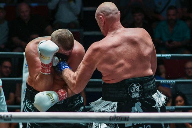 July 24, 2026, Pattaya, Chonburi, Thailand: Tyson Fury (L) and Mariusz Wach (R) exchanging punches during their heavyweight boxing bout. Tyson Fury defeats Mariusz Wach by corner retirement after seven rounds to win the WBC Humanitarian Belt at Max Muay Thai Stadium. Pattaya Thailand - ZUMAs197 20260724_aaa_s197_091 Copyright: xWasimxMatherx