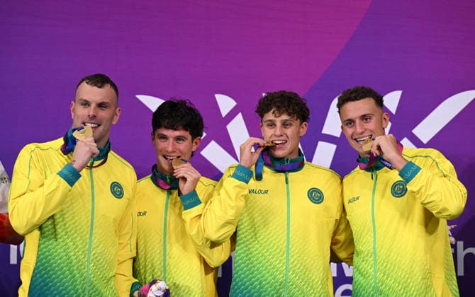 COM26 SWIMMING FINALS, (L-R) Kyle Chalmers, Harrison Turner, Kai Taylor and Flynn Southam of Australia during the medal ceremony after winning Gold in the Mens 4 x 100m Freestyle Relay Final during the Glasgow 2026 Commonwealth Games at the Tollcross International Swimming Centre in Glasgow, Scotland, Friday, July 24, 2026. ( NO ARCHIVING, EDITORIAL USE ONLY Glasgow Scotland United Kingdom  Copyright: xDEANxLEWINSx 20260725177829327108