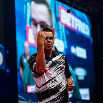 RECORD DATE NOT STATED 24th July 2026, Winter Gardens, Blackpool, Lancashire, England; 2026 Betfred World Matchplay Darts, Day Seven; Gian van Veen throws his flights to the fans after winning his quarter final match against James Wade GodfreyxPitt
