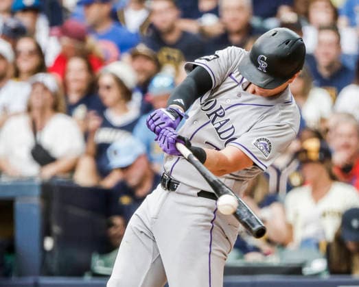 Colorado Rockies first baseman TJ Rumfield hits s single in the seventh inning of the MLB, Baseball Herren, USA game between the Colorado Rockies and the Milwaukee Brewers at American Family Field in Milwaukee, Wisconsin on Friday July 24, 2026. The Rockies defeated the Brewers 5-2.  MIL20260724830 TANNENxMAURY