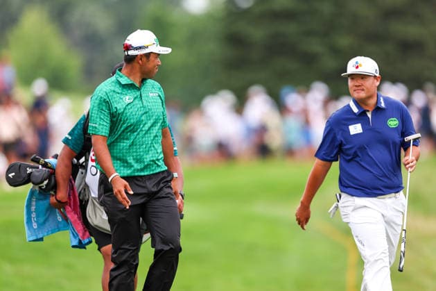 Hideki Matsuyama of Japan and Sungjae Im of South Korea interact while walking on the 17th hole during the second round of the 2026 3M Open at TPC Twin Cities on July 24, 2026 in Blaine, Minnesota. CSM Blaine USA - ZUMAc04_ 20260724_zma_c04_146 Copyright: xStevenxGarciax