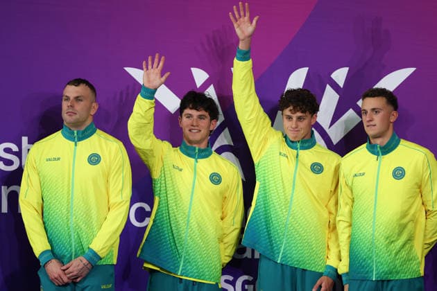 July 24, 2026, Glasgow, Scotland, Great Britain: KYLE CHALMERS, HARRISON TURNER, KAI TAYLOT and FLYNN SOUTHAM of Australia wait for their gold medals in the the Women s 4 x 100m Freestyle Relay Medal Ceremony of the Commonwealth Games Glasgow 2026 at the Tollcross International Swimming Centre in Glasgow, Scotland Glasgow Great Britain - ZUMAc179 20260724_zep_c179_581 Copyright: xMickaelxChavetx