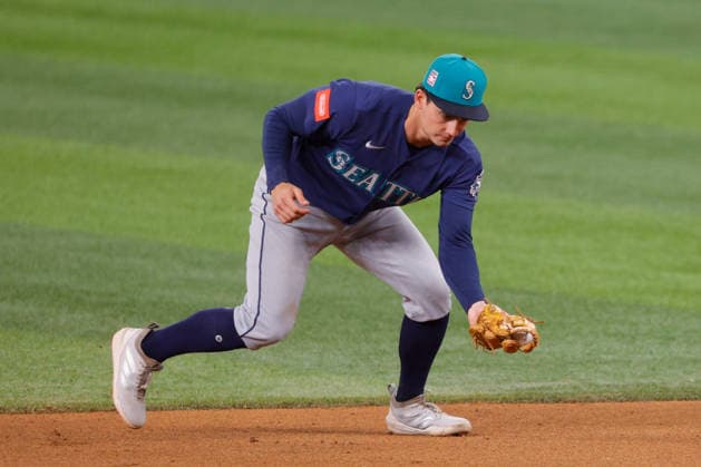 July 24, 2026, Arlington, Texas, USA: Seattle Mariners shortstop COLT EMERSON (4) collects a grounder in the seventh inning during a baseball game, Friday, July 24, 2026, in Arlington, Texas. Arlington USA - ZUMAa325 20260724_zsa_a325_042 Copyright: xDavidxBalleringxIix