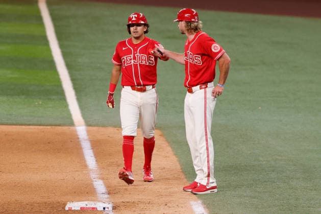 July 24, 2026, Arlington, Texas, USA: Texas Rangers shortstop NICKY LOPEZ (33) bunts for a base hit and forces in a run in the sixth inning during a baseball game, Friday, July 24, 2026, in Arlington, Texas. Arlington USA - ZUMAa325 20260724_zsa_a325_044 Copyright: xDavidxBalleringxIix