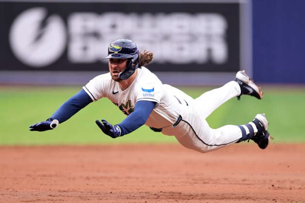 July 24, 2026, St. Petersburg, Florida, USA: Tampa Bay Rays second baseman Ryan Vilade (26) slides at third base before the umpires call that he homered to left field during an MLB, Baseball Herren, USA game against the Cleveland Guardians on July 24, 2026 at Tropicana Field. The Rays beat the Guardians 11-3. St. Petersburg USA - ZUMAh180 20260724_zsp_h180_006 Copyright: xKimxHukarix