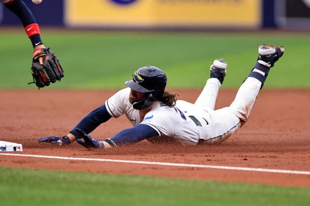 July 24, 2026, St. Petersburg, Florida, USA: Tampa Bay Rays second baseman Ryan Vilade (26) slides at third base before the umpires call that he homered to left field during an MLB, Baseball Herren, USA game against the Cleveland Guardians on July 24, 2026 at Tropicana Field. The Rays beat the Guardians 11-3. St. Petersburg USA - ZUMAh180 20260724_zsp_h180_021 Copyright: xKimxHukarix