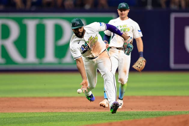 July 24, 2026, St. Petersburg, Florida, USA: Tampa Bay Rays third baseman Junior Caminero (13) attempts to field a ground ball off the bat of Cleveland Guardians third baseman Gabriel Arias (13) during an MLB, Baseball Herren, USA game on July 24, 2026 at Tropicana Field. The Rays beat the Guardians 11-3. St. Petersburg USA - ZUMAh180 20260724_zsp_h180_029 Copyright: xKimxHukarix