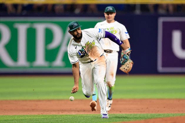 July 24, 2026, St. Petersburg, Florida, USA: Tampa Bay Rays third baseman Junior Caminero (13) attempts to field a ground ball off the bat of Cleveland Guardians third baseman Gabriel Arias (13) during an MLB, Baseball Herren, USA game on July 24, 2026 at Tropicana Field. The Rays beat the Guardians 11-3. St. Petersburg USA - ZUMAh180 20260724_zsp_h180_050 Copyright: xKimxHukarix