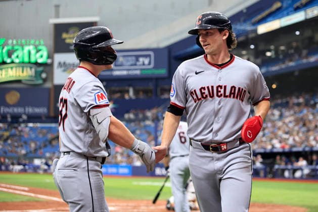 July 24, 2026, St. Petersburg, Florida, USA: Cleveland Guardians second baseman Travis Bazzana (37) congratulates designated hitter Chase DeLauter (24) after scoring on a double by shortstop Brayan Rocchio (4) during an MLB, Baseball Herren, USA game against the Tampa Bay Rays on July 24, 2026 at Tropicana Field. The Rays beat the Guardians 11-3. St. Petersburg USA - ZUMAh180 20260724_zsp_h180_065 Copyright: xKimxHukarix