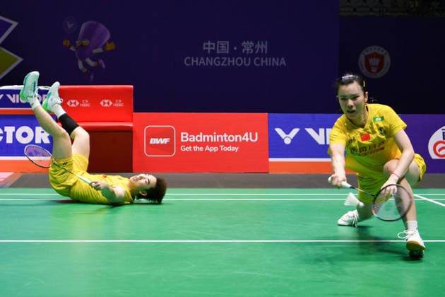 CHANGZHOU, CHINA - JULY 25: Guo Xinwa and Chen Fanghui of China compete in the Mixed Doubles Semifinal match against Dechapol Puavaranukroh and Supissara Paewsampran of Thailand on day 5 of the China Open 2026 at Changzhou Olympic Sports Center Gymnasium on July 25, 2026 in Changzhou, Jiangsu Province of China.  Copyright: xVCGx 111656308385