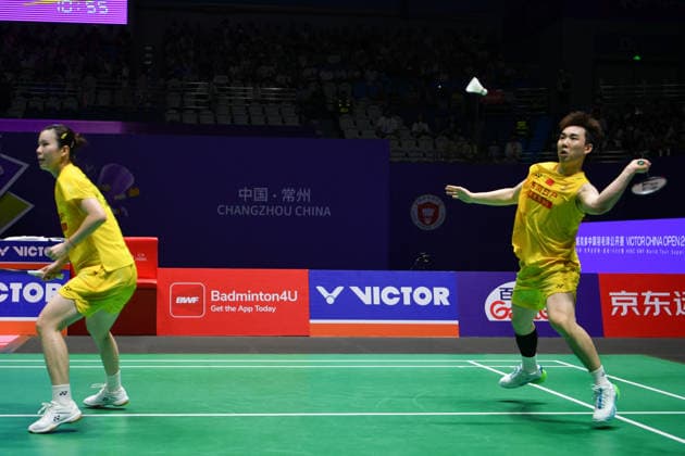 CHANGZHOU, CHINA - JULY 25: Guo Xinwa and Chen Fanghui of China compete in the Mixed Doubles Semifinal match against Dechapol Puavaranukroh and Supissara Paewsampran of Thailand on day 5 of the China Open 2026 at Changzhou Olympic Sports Center Gymnasium on July 25, 2026 in Changzhou, Jiangsu Province of China.  Copyright: xVCGx 111656308387