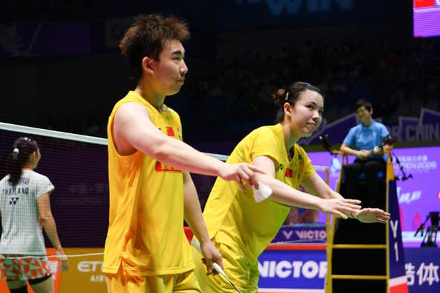 CHANGZHOU, CHINA - JULY 25: Guo Xinwa and Chen Fanghui of China react in the Mixed Doubles Semifinal match against Dechapol Puavaranukroh and Supissara Paewsampran of Thailand on day 5 of the China Open 2026 at Changzhou Olympic Sports Center Gymnasium on July 25, 2026 in Changzhou, Jiangsu Province of China.  Copyright: xVCGx 111656308390