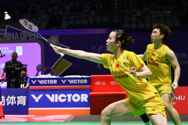 CHANGZHOU, CHINA - JULY 25: Guo Xinwa and Chen Fanghui of China compete in the Mixed Doubles Semifinal match against Dechapol Puavaranukroh and Supissara Paewsampran of Thailand on day 5 of the China Open 2026 at Changzhou Olympic Sports Center Gymnasium on July 25, 2026 in Changzhou, Jiangsu Province of China.  Copyright: xVCGx 111656308378