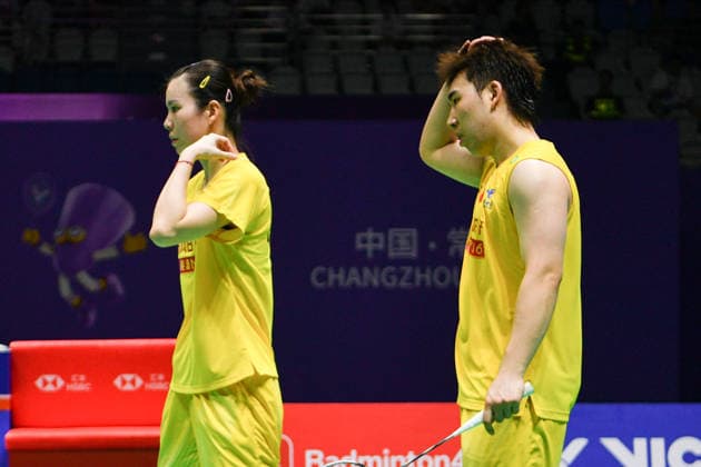 CHANGZHOU, CHINA - JULY 25: Guo Xinwa and Chen Fanghui of China react in the Mixed Doubles Semifinal match against Dechapol Puavaranukroh and Supissara Paewsampran of Thailand on day 5 of the China Open 2026 at Changzhou Olympic Sports Center Gymnasium on July 25, 2026 in Changzhou, Jiangsu Province of China.  Copyright: xVCGx 111656308379