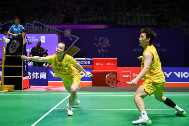 CHANGZHOU, CHINA - JULY 25: Guo Xinwa and Chen Fanghui of China compete in the Mixed Doubles Semifinal match against Dechapol Puavaranukroh and Supissara Paewsampran of Thailand on day 5 of the China Open 2026 at Changzhou Olympic Sports Center Gymnasium on July 25, 2026 in Changzhou, Jiangsu Province of China.  Copyright: xVCGx 111656308380
