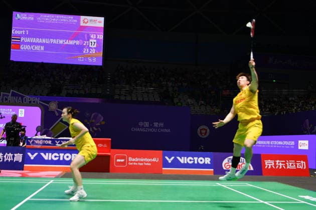 CHANGZHOU, CHINA - JULY 25: Guo Xinwa and Chen Fanghui of China compete in the Mixed Doubles Semifinal match against Dechapol Puavaranukroh and Supissara Paewsampran of Thailand on day 5 of the China Open 2026 at Changzhou Olympic Sports Center Gymnasium on July 25, 2026 in Changzhou, Jiangsu Province of China.  Copyright: xVCGx 111656308381