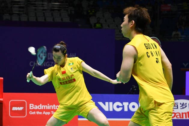 CHANGZHOU, CHINA - JULY 25: Guo Xinwa and Chen Fanghui of China compete in the Mixed Doubles Semifinal match against Dechapol Puavaranukroh and Supissara Paewsampran of Thailand on day 5 of the China Open 2026 at Changzhou Olympic Sports Center Gymnasium on July 25, 2026 in Changzhou, Jiangsu Province of China.  Copyright: xVCGx 111656308373