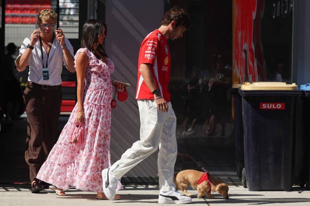 F1 Hungarian Grand Prix 2026 Charles Leclerc of Ferrari and his wife Alexandra Leclerc walk with their dog Leo through the paddock prior to final practice ahead Formula 1 Hungarian Grand Prix at the Hungaroring circuit in Mogyorod near Budapest on July 25th, 2026. Budapest Hungary  Copyright: xBeataxZawrzelx originalFilename:zawrzel-f1hungar260725_npMKX.jpg