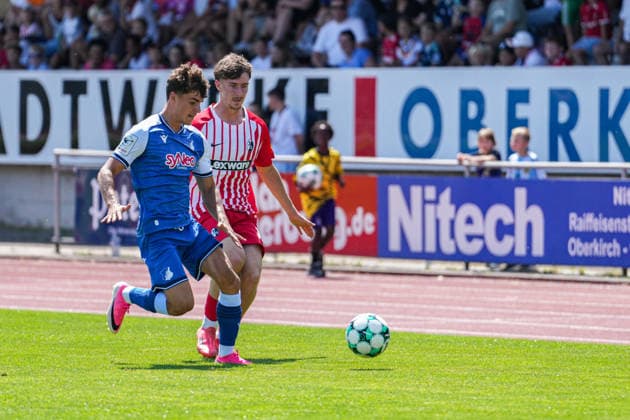 Testspiel, SC Freiburg U23 vs TSG Hoffenheim II, 25.07.2026 Zweikampf zwischen Matthew Moore (TSG Hoffenheim II, 15) und Emilio Schiertz (SC Freiburg U23, 12) Testspiel, SC Freiburg U23 vs TSG Hoffenheim II, Renchtal-Stadion Oberkirch, 25.07.2026 DFB DFL REGULATIONS PROHIBIT ANY USE OF PHOTOGRAPHS AS IMAGE SEQUENCES AND OR QUASI-VIDEO *** Friendly Match, SC Freiburg U23 vs. TSG Hoffenheim II, July 25, 2026. A tackle between Matthew Moore (TSG Hoffenheim II, No. 15) and Emilio Schiertz (SC Freiburg U23), 12 Friendly match, SC Freiburg U23 vs. TSG Hoffenheim II, Renchtal Stadium, Oberkirch, July 25, 2026 DFB and DFL regulations prohibit any use of photographs as image sequences and or quasi-video Copyright: xBEAUTIFULxSPORTS Boscox