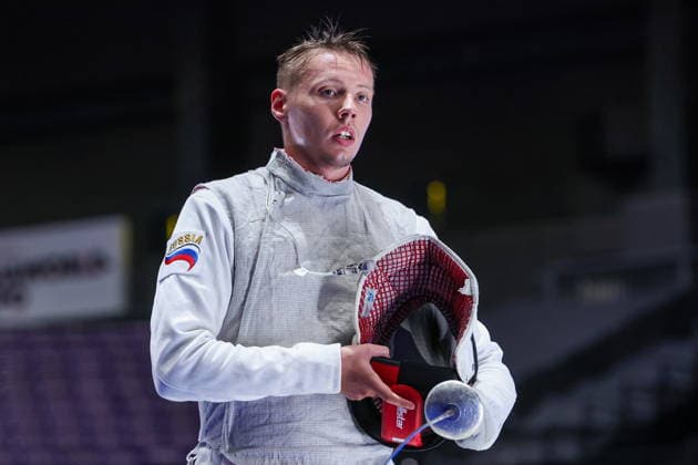 CHINA, HONG KONG - JULY 25, 2026: Russia s Yegor Barannikov competes in the men’s individual foil event at the 2026 Kerry Fencing World Championships. Mikhail Sinitsyn TASS  95428076