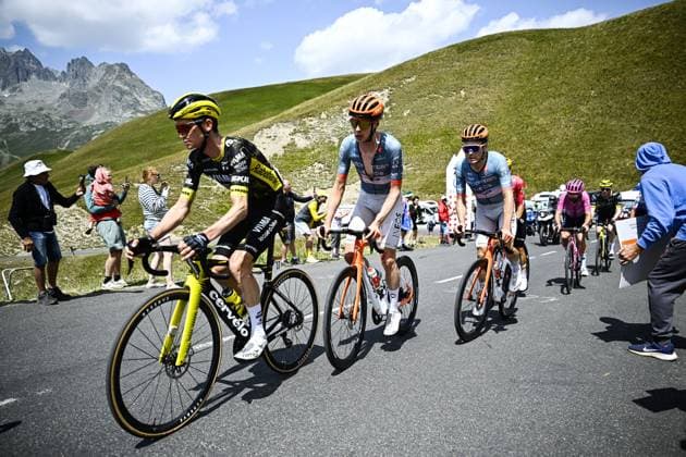 American Sepp Kuss of Team Visma-Lease a Bike and Dutch Thymen Arensman of Netcompany-INEOS pictured in action during stage 20 of the 2026 Tour de France cycling race, a stage of 171km Le Bourg d Oisans to Alpe d Huez, on Saturday 25 July 2026. The 113th edition of the Tour de France starts on Saturday 4 July in Barcelona, Spain, and will finish in Paris, France on the 26th of July. JASPERxJACOBS  x181999793x