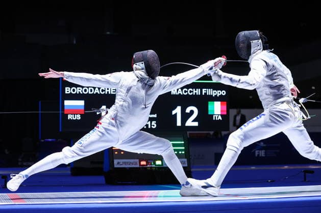 CHINA, HONG KONG - JULY 25, 2026: Russia s Kirill Borodachev (L) and Italy s Filippo Macchi compete in the men’s individual foil event at the 2026 Kerry Fencing World Championships. Mikhail Sinitsyn TASS  95428212