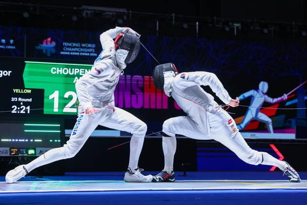 CHINA, HONG KONG - JULY 25, 2026: Russia s Yegor Barannikov (L) and the Czech Republic s Alexander Choupenitch compete in the men™s individual foil event at the 2026 Kerry Fencing World Championships 2026 Fencing World Championships In Hong Kong  - ZUMAt113 20260725_zaa_t113_063 Copyright: xMikhailxSinitsynx