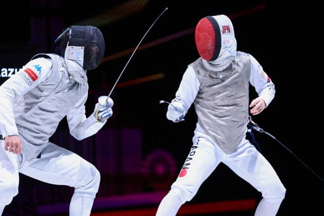 CHINA, HONG KONG - JULY 25, 2026: Italy s Filippo Macchi (L) and Japan s Kazuki Iimura compete in the men’s individual foil event at the 2026 Kerry Fencing World Championships. Mikhail Sinitsyn TASS  95429395