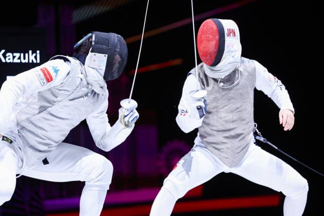 CHINA, HONG KONG - JULY 25, 2026: Italy s Filippo Macchi (L) and Japan s Kazuki Iimura compete in the men’s individual foil event at the 2026 Kerry Fencing World Championships. Mikhail Sinitsyn TASS  95429465