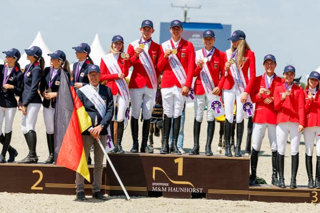 HAGEN a.T.W. - FEI Jumping European Championship, EM, Europameisterschaft Children, Juniors and Young Rider 2026, HAGEN a.T.W. - FEI Jumping European Championship Children, Juniors and Young Rider 2026 Team Germany TILLMANN Lennard (GER), STORMANNS Tony (GER), MERSCHFORMANN Malte (GER), BEERBAUM Brianne (GER), KUEHNER Jolie Marie (GER), SEEMANN Eberhard (Chef dÂ Equipe) Championship ceremony Team Final Nations Cup CH-EU-J-S - Juniors 2nd COMPETITION Teams & Individuals over two rounds - SECOND ROUND Hagen a.T.W., Reitanlage Haunhorst 25. July 2026 - *** HAGEN a T W FEI Jumping European Championship for Children, Juniors, and Young Riders 2026, HAGEN a T W FEI Jumping European Championship for Children, Juniors, and Young Riders 2026 Team Germany: Lennard TILLMANN (GER), Tony STORMANNS (GER), Malte MERSCHFORMANN (GER), Brianne BEERBAUM (GER), KUEHNER Jolie Marie GER, SEEMANN Eberhard, Chef d’Equipe Championship Ceremony Team Final Nations Cup CH EU J S Juniors 2nd COMPETITION Teams Individuals over two rounds SECOND ROUND Hagen a T W, Haunhorst Equestrian Center, July 25, 2026