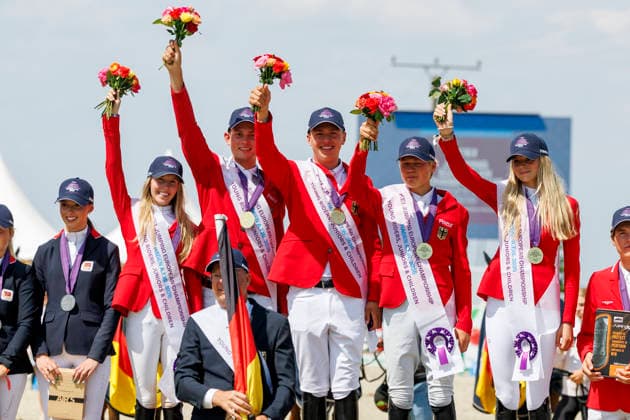 HAGEN a.T.W. - FEI Jumping European Championship, EM, Europameisterschaft Children, Juniors and Young Rider 2026, HAGEN a.T.W. - FEI Jumping European Championship Children, Juniors and Young Rider 2026 Team Germany TILLMANN Lennard (GER), STORMANNS Tony (GER), MERSCHFORMANN Malte (GER), BEERBAUM Brianne (GER), KUEHNER Jolie Marie (GER), SEEMANN Eberhard (Chef dÂ Equipe) Championship ceremony Team Final Nations Cup CH-EU-J-S - Juniors 2nd COMPETITION Teams & Individuals over two rounds - SECOND ROUND Hagen a.T.W., Reitanlage Haunhorst 25. July 2026 - *** HAGEN a T W FEI Jumping European Championship for Children, Juniors, and Young Riders 2026, HAGEN a T W FEI Jumping European Championship for Children, Juniors, and Young Riders 2026 Team Germany: Lennard TILLMANN (GER), Tony STORMANNS (GER), Malte MERSCHFORMANN (GER), Brianne BEERBAUM (GER), KUEHNER Jolie Marie GER, SEEMANN Eberhard, Chef d’Equipe Championship Ceremony Team Final Nations Cup CH EU J S Juniors 2nd COMPETITION Teams Individuals over two rounds SECOND ROUND Hagen a T W, Haunhorst Equestrian Center, July 25, 2026
