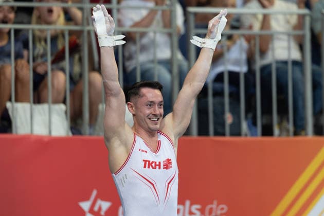 Deutsche Meisterschaften im Gerätturnen 2026, Gerätfinals Andreas Toba (Turn-Klubb zu Hannover) jubelt nach seiner Übung im Gerätfinale an den Ringen. Deutsche Meisterschaften im Gerätturnen, Gerätfinals, am 25. Juli 2026 in der ZAG-Arena in Hannover., Hannover Niedersachsen Deutschland ZAG Arena *** 2026 German Artistic Gymnastics Championships, Apparatus Finals: Andreas Toba of Turn Klubb zu Hannover celebrates after his routine in the rings apparatus final at the German Artistic Gymnastics Championships, Apparatus Finals, on July 25, 2026, at the ZAG Arena in Hanover, Hanover, Lower Saxony, Germany, ZAG Arena