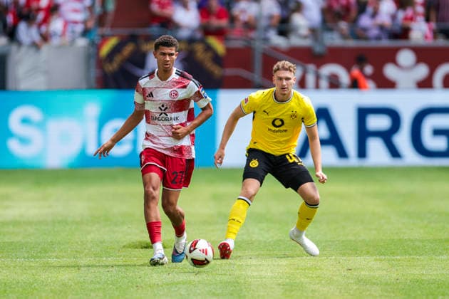 25.07.2026, Fussball, Testspiel Fortuna Düsseldorf - Borussia Dortmund. (Fortuna Düsseldorf). Jordi Paulina (Fortuna Düsseldorf), Elias Benkara (Borussia Dortmund). Düsseldorf Trainingsgelände des BVB NRW Deutschland xRHR-FOTO DEx *** July 25, 2026, Soccer, Friendly Match: Fortuna Düsseldorf vs. Borussia Dortmund, Fortuna Düsseldorf: Jordi Paulina; Borussia Dortmund: Elias Benkara, Düsseldorf, BVB Training Facility, North Rhine-Westphalia, Germany, xRHR PHOTO DEx Copyright: DennisxEwert RHR-FOTOx RHR-FOTO DE