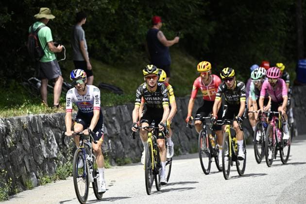 Australian Jai Hindley of Red Bull-BORA-hansgrohe and American Sepp Kuss of Team Visma-Lease a Bike pictured in action during stage 20 of the 2026 Tour de France cycling race, a stage of 171km Le Bourg d Oisans to Alpe d Huez, on Saturday 25 July 2026. The 113th edition of the Tour de France starts on Saturday 4 July in Barcelona, Spain, and will finish in Paris, France on the 26th of July. JASPERxJACOBS  x182002304x