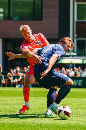 SOCCER - Bremen vs Bochum, test match ZELL AM ZILLER,AUSTRIA,25.JUL.26 - SOCCER - 1. DFL, 1. Deutsche Bundesliga, 2. DFL, 2. Deutsche Bundesliga, SV Werder Bremen vs VfL Bochum, test match. Image shows Marco Gruell (Bremen) and Christian Rasmussen Bochum).  GEPAxpictures xOleskiixMarusyk