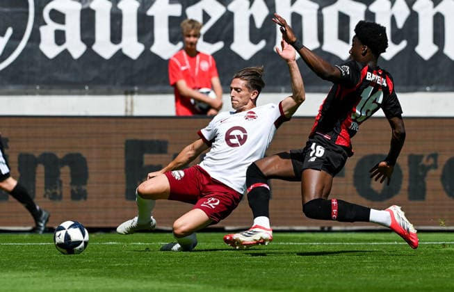 25.07.2026, xpsx, Fussball Testspiel, Kickers Offenbach - Bayer 04 Leverkusen v.l. Jan-Hendrik Marx (Offenbacher Kickers), Axel Tape (Bayer 04 Leverkusen) (DFL DFB REGULATIONS PROHIBIT ANY USE OF PHOTOGRAPHS as IMAGE SEQUENCES and or QUASI-VIDEO) emspor Offenbach *** July 25, 2026, xpsx, Soccer Friendly Match, Kickers Offenbach vs. Bayer 04 Leverkusen, Jan Hendrik Marx, Offenbacher Kickers, Axel Tape, Bayer 04 Leverkusen. DFL and DFB regulations prohibit any use of photographs as image sequences and or quasi-video. emspor Offenbach