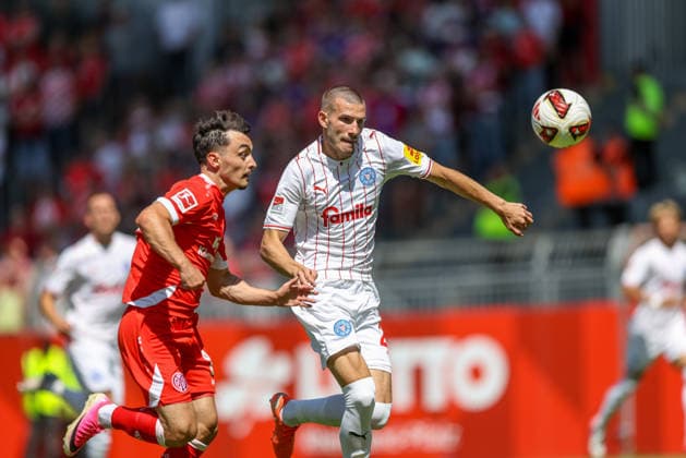GER, Mainz, FSV Mainz 05 vs Holstein Kiel, Vorbereitung, Fussball, DFB, Spielzeit 2026 2027, Bruchwegstadion auf dem Wolfgang Frank Campus, Testspiel im Bild v.l.: Paul Nebel (FSV Mainz 05 8), Ivan NekiÄ‡ (Holstein Kiel 13) DFB DFL REGULATIONS PROHIBIT ANY USE OF PHOTOGRAPHS AS IMAGE SEQUENCES AND OR QUASI-VIDEO, 25.07.2026 *** GER, Mainz, FSV Mainz 05 vs. Holstein Kiel, Preseason, Soccer, DFB, 2026–2027 Season, Bruchwegstadion on the Wolfgang Frank Campus, Friendly Match: Pictured from left, Paul Nebel (FSV Mainz 05 8), Ivan Nekic, Holstein Kiel 13. DFB and DFL regulations prohibit any use of photographs as image sequences and or quasi-video. July 25, 2026 Copyright: HMBxMedia HendrikxHamelau