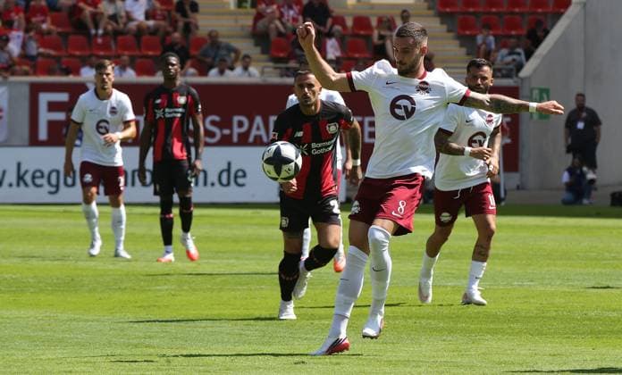25.07.2026 xmgoodx Offenbach am Main, Plutos Stadion am Bieberer Berg - Jubiläumsspiel Kickers Offenbach (OFC) - Bayer 04 Leverkusen. Maximilian Wolfram (8, OFC) *** July 25, 2026 xmgoodx Offenbach am Main, Pluto Stadium at Bieberer Berg Anniversary Match: Kickers Offenbach vs. OFC Bayer 04 Leverkusen Maximilian Wolfram 8, OFC