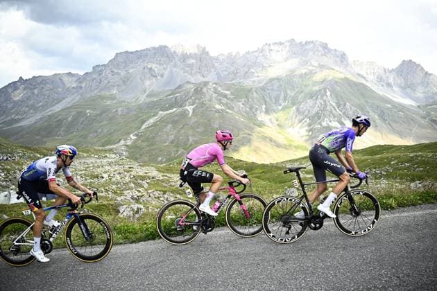 Italian Mattia Cattaneo of Red Bull-BORA-hansgrohe, American Sean Quinn of EF Education-EasyPost and Australian Ben O Connor of Team Jayco AlUla pictured in action during stage 20 of the 2026 Tour de France cycling race, a stage of 171km Le Bourg d Oisans to Alpe d Huez, on Saturday 25 July 2026. The 113th edition of the Tour de France starts on Saturday 4 July in Barcelona, Spain, and will finish in Paris, France on the 26th of July. JASPERxJACOBS  x182009605x