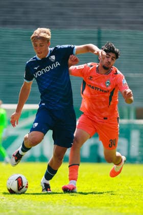 SOCCER - Bremen vs Bochum, test match ZELL AM ZILLER,AUSTRIA,25.JUL.26 - SOCCER - 1. DFL, 1. Deutsche Bundesliga, 2. DFL, 2. Deutsche Bundesliga, SV Werder Bremen vs VfL Bochum, test match. Image shows Lasse Isbruch (Bochum) and Wesley Adeh (Bremen).  GEPAxpictures xOleskiixMarusyk