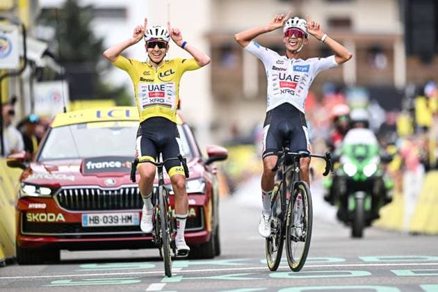 Slovenian Tadej Pogacar of UAE Team Emirates-XRG and Mexican Isaac Del Toro of UAE Team Emirates-XRG celebrate as they cross the finish line of stage 20 of the 2026 Tour de France cycling race, a stage of 171km Le Bourg d Oisans to Alpe d Huez, on Saturday 25 July 2026. The 113th edition of the Tour de France starts on Saturday 4 July in Barcelona, Spain, and will finish in Paris, France on the 26th of July. DAVIDxPINTENS  x182010525x