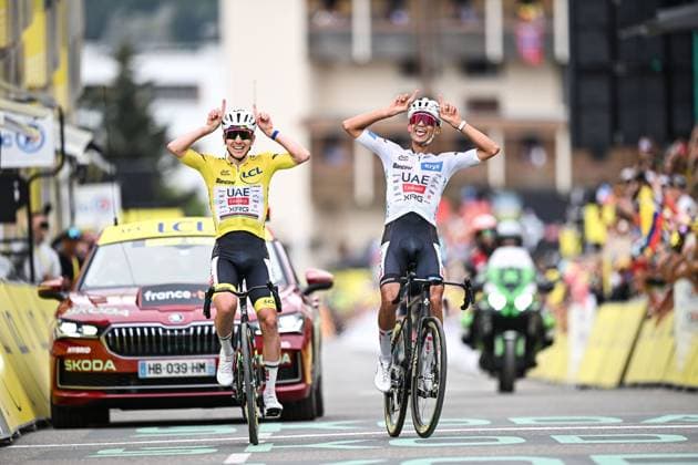 Slovenian Tadej Pogacar of UAE Team Emirates-XRG and Mexican Isaac Del Toro of UAE Team Emirates-XRG celebrate as they cross the finish line of stage 20 of the 2026 Tour de France cycling race, a stage of 171km Le Bourg d Oisans to Alpe d Huez, on Saturday 25 July 2026. The 113th edition of the Tour de France starts on Saturday 4 July in Barcelona, Spain, and will finish in Paris, France on the 26th of July. DAVIDxPINTENS  x182010529x